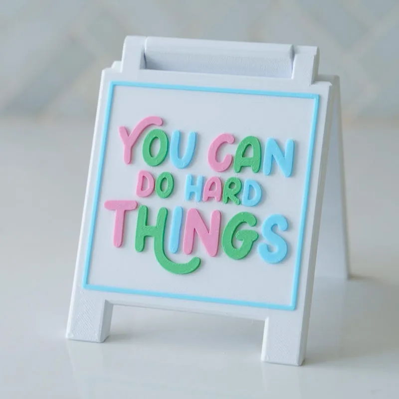 Pastel easel sign that reads You Can Do Hard Things